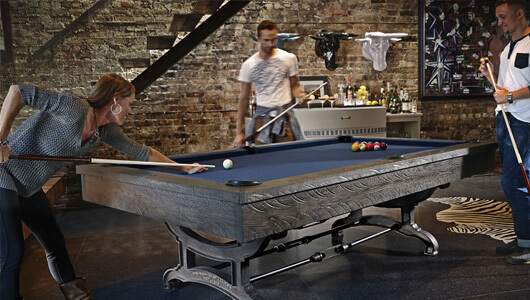 Adults playing billiards