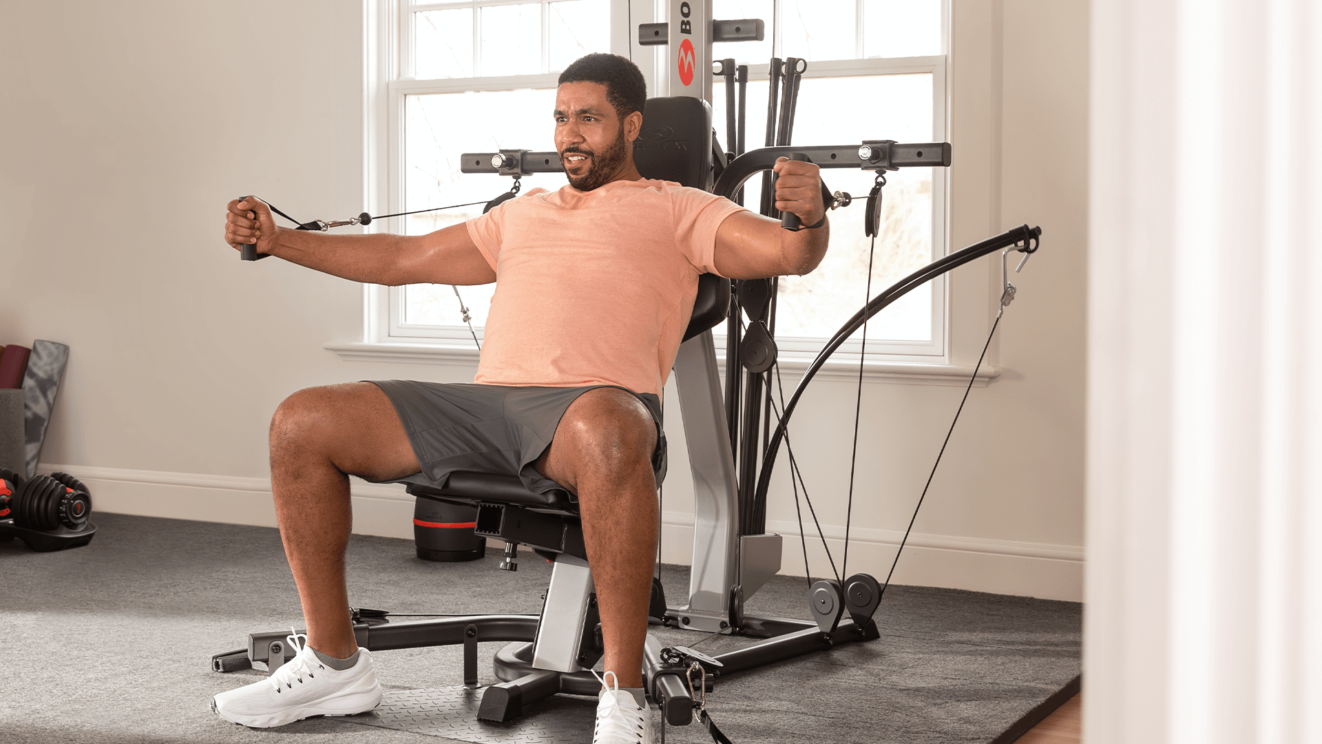 Man on Bowflex Xtreme 2 SE Home Gym Rod Resistance