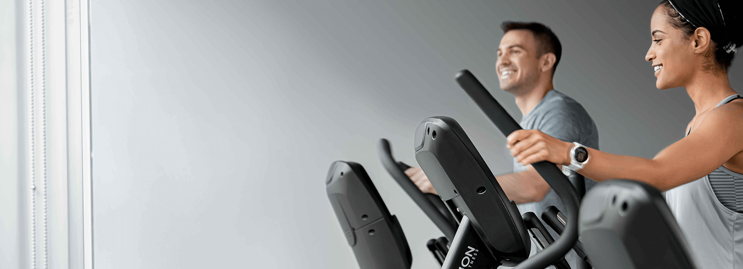 Man & Woman working out on Vision S60 Suspension Elliptical