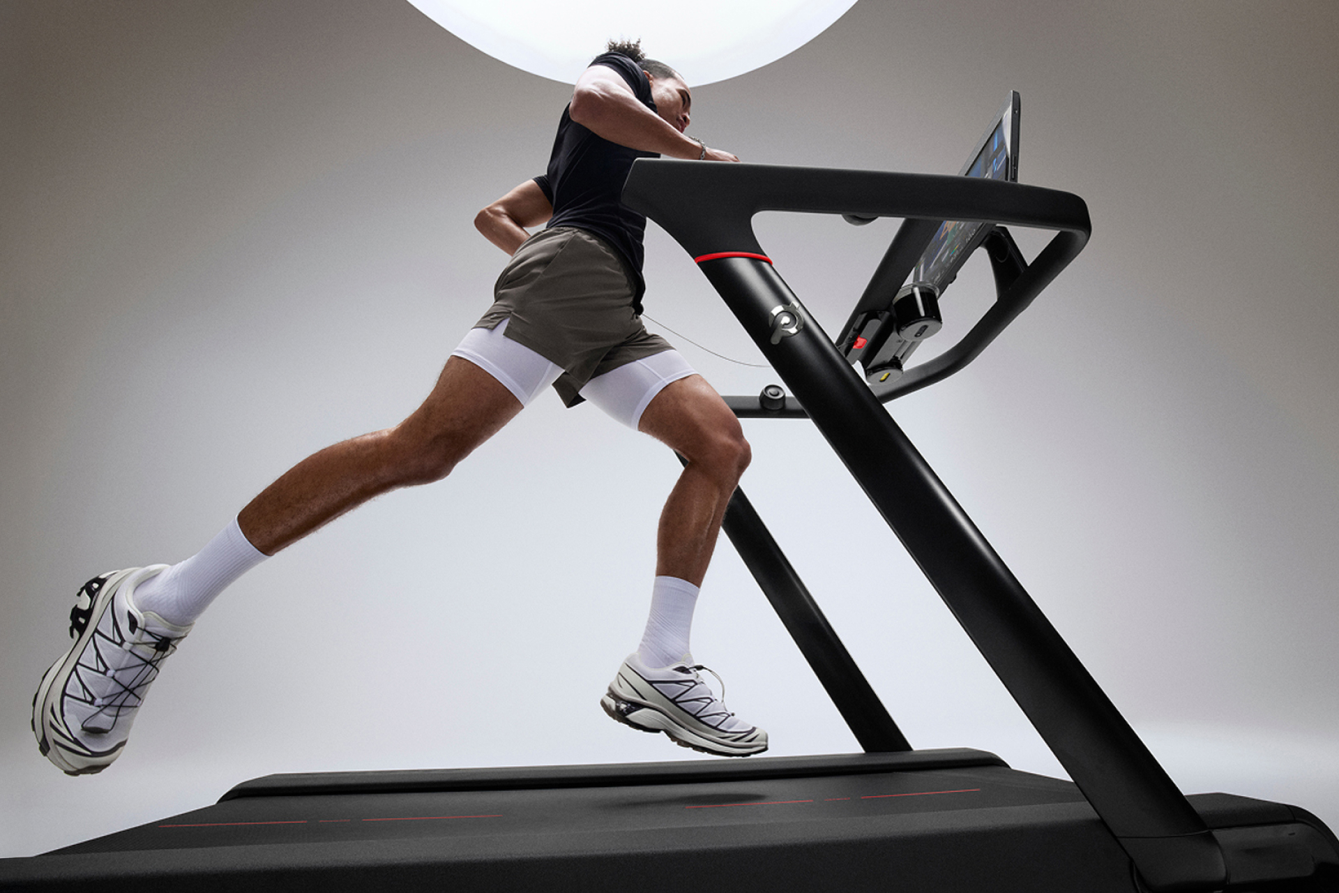 Man running on Peloton treadmill