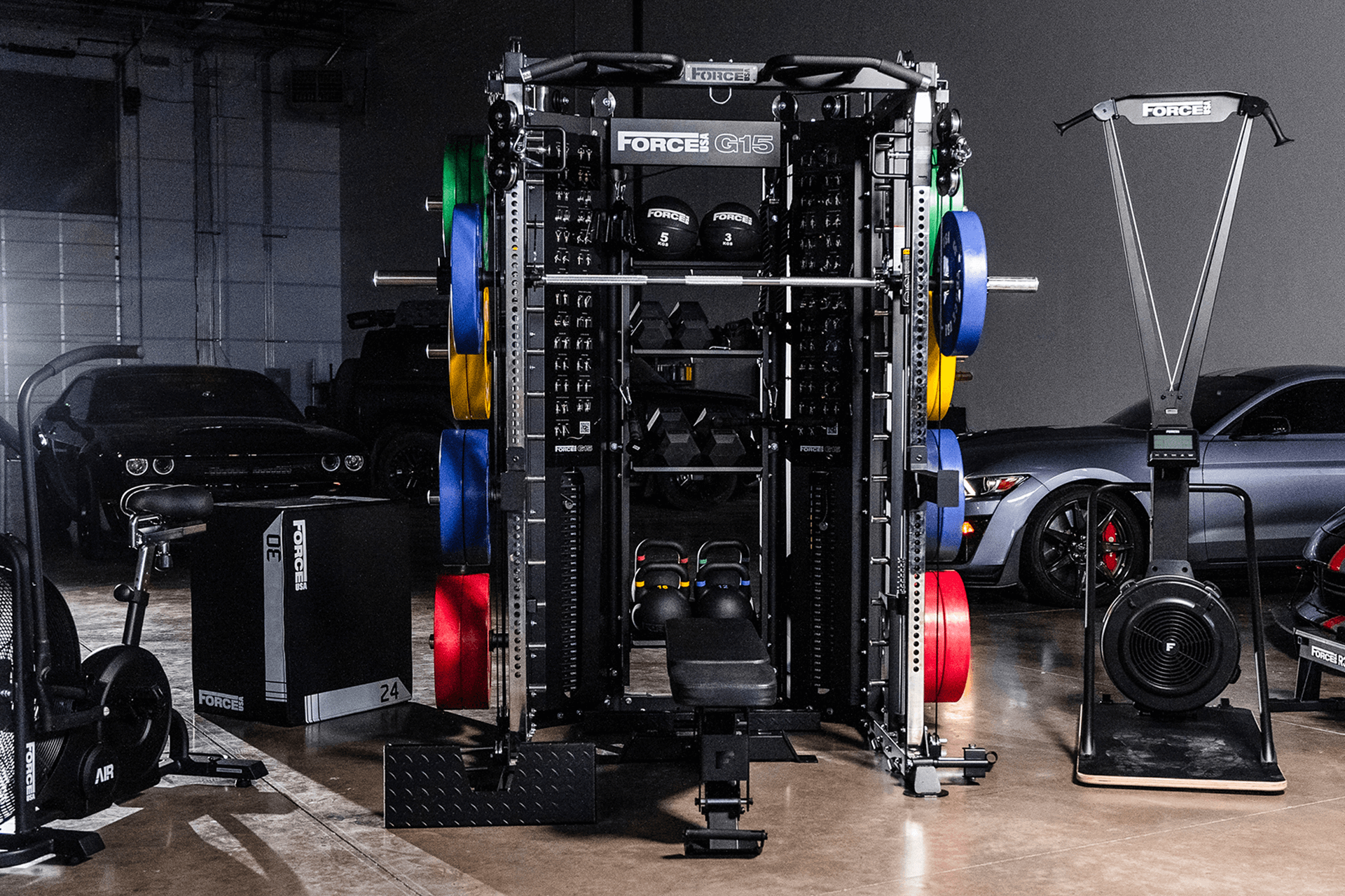 Man working out on Matrix functional trainer in his home workout space