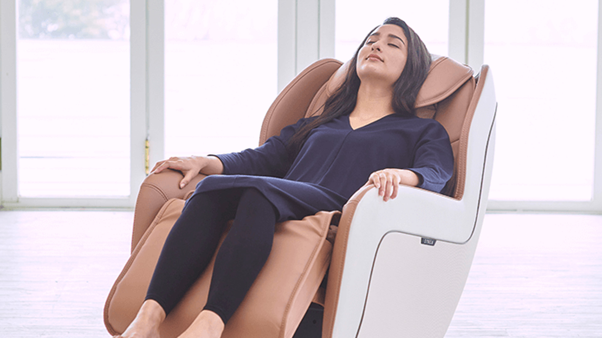 Woman relaxing in Circ+ Massage Chair