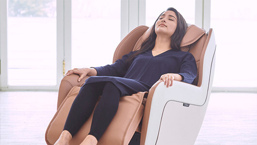 Woman relaxing in Circ+ Massage Chair