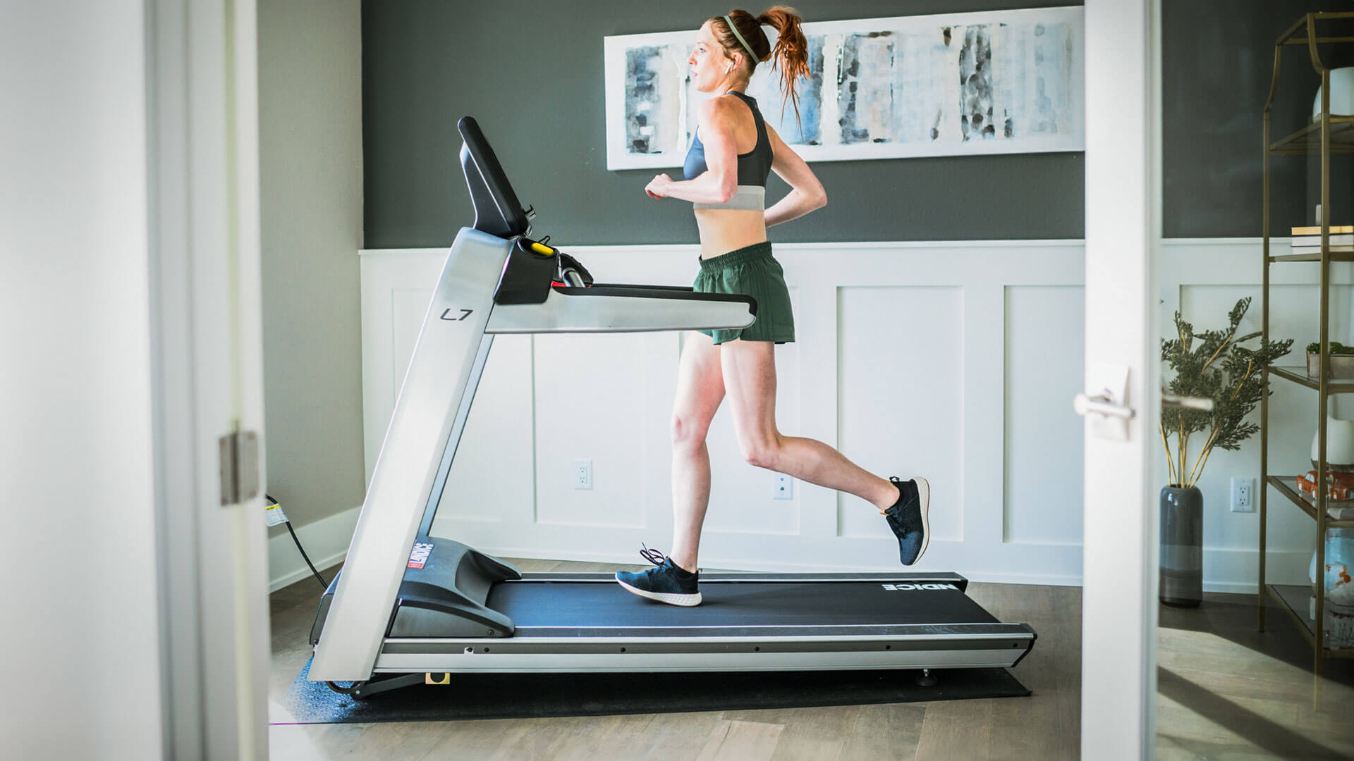 Woman running on Landice L7 treadmill
