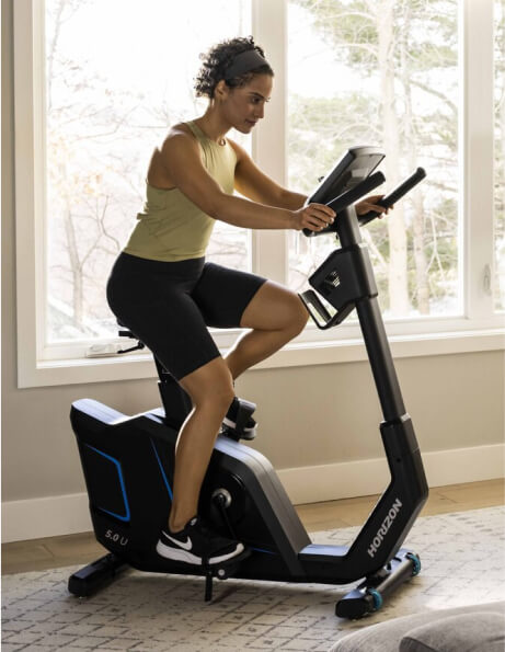 Woman working out on exercise bike