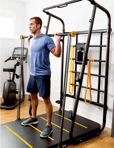 Man working out on a home gym