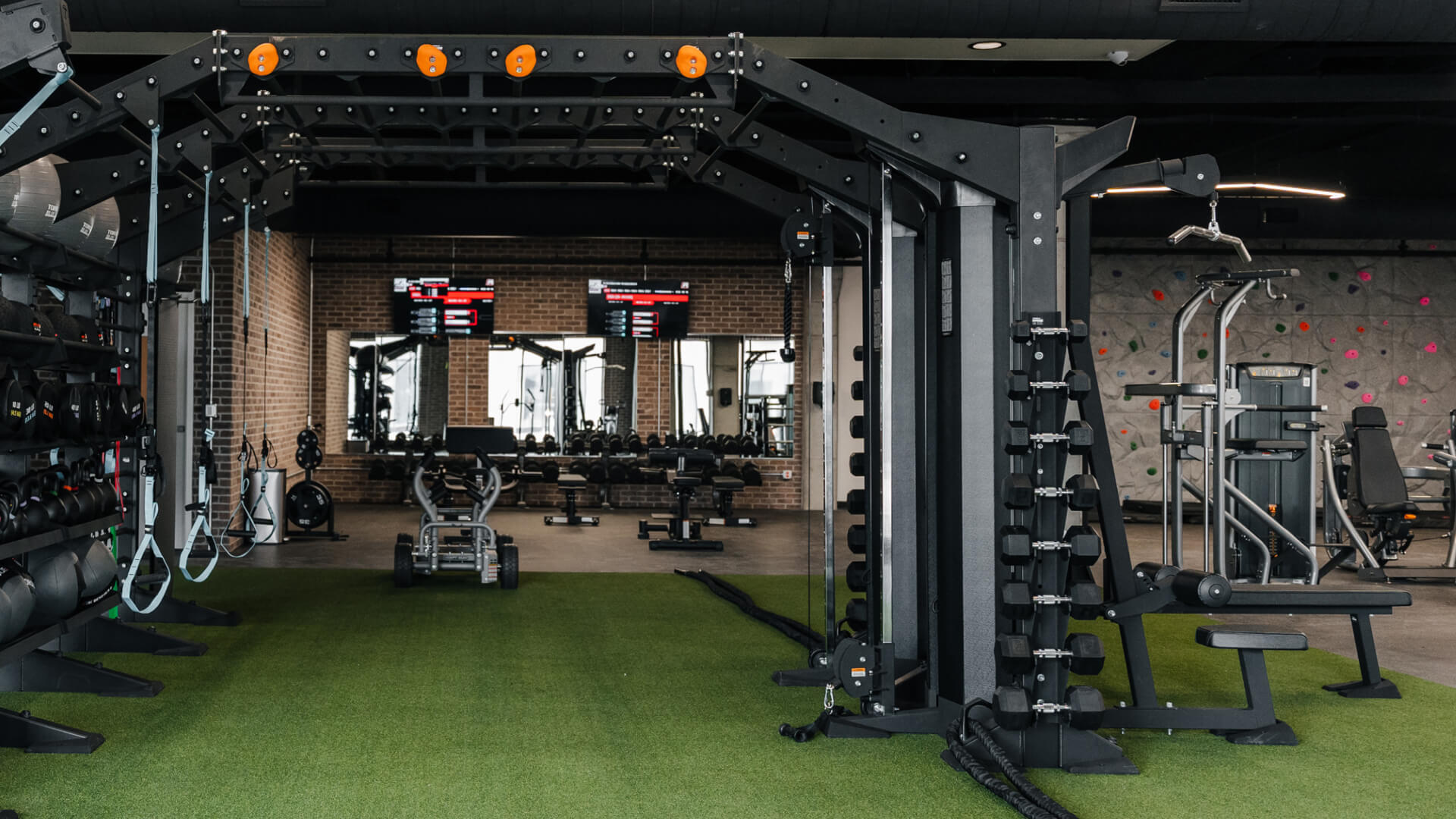 Fitness center outfitted for a multifamily community showing strength equipment